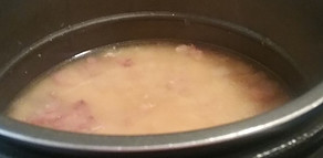 Cooked ham and beans in a pressure cooker