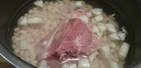 Ham and beans in a pressure cooker.