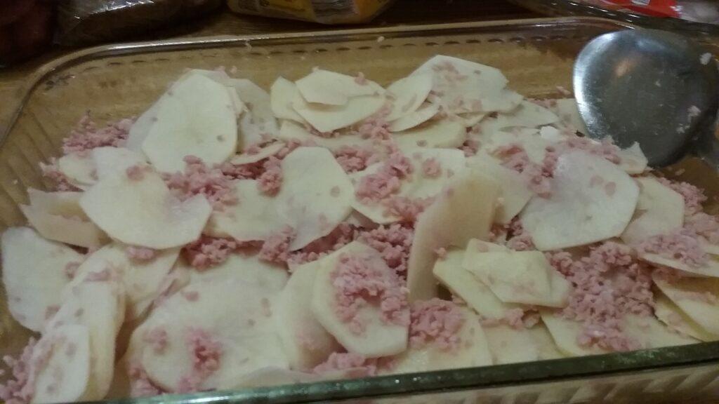 Sliced ham and potatoes