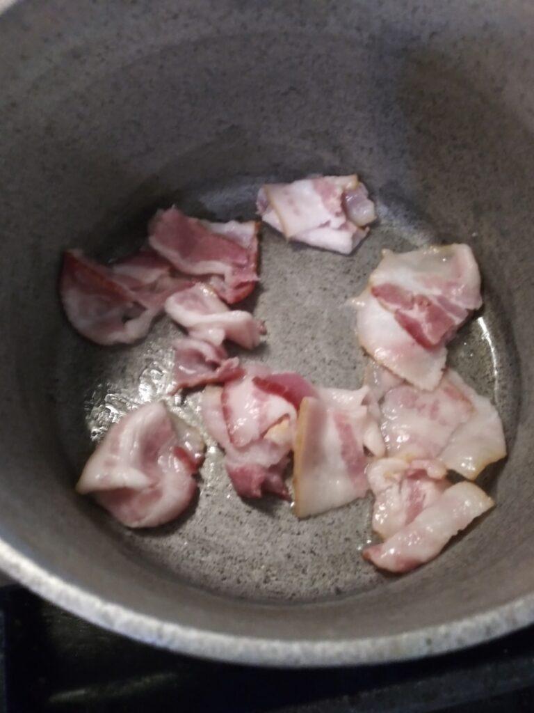 Frying bacon in a pan