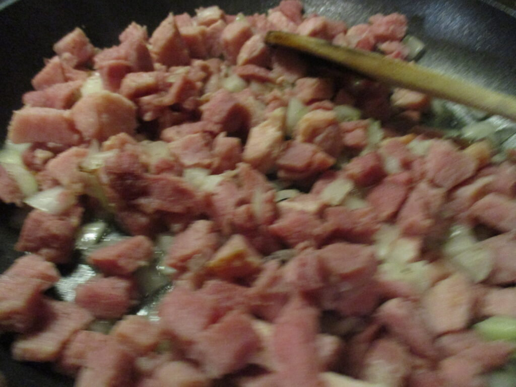Frying ham and onions